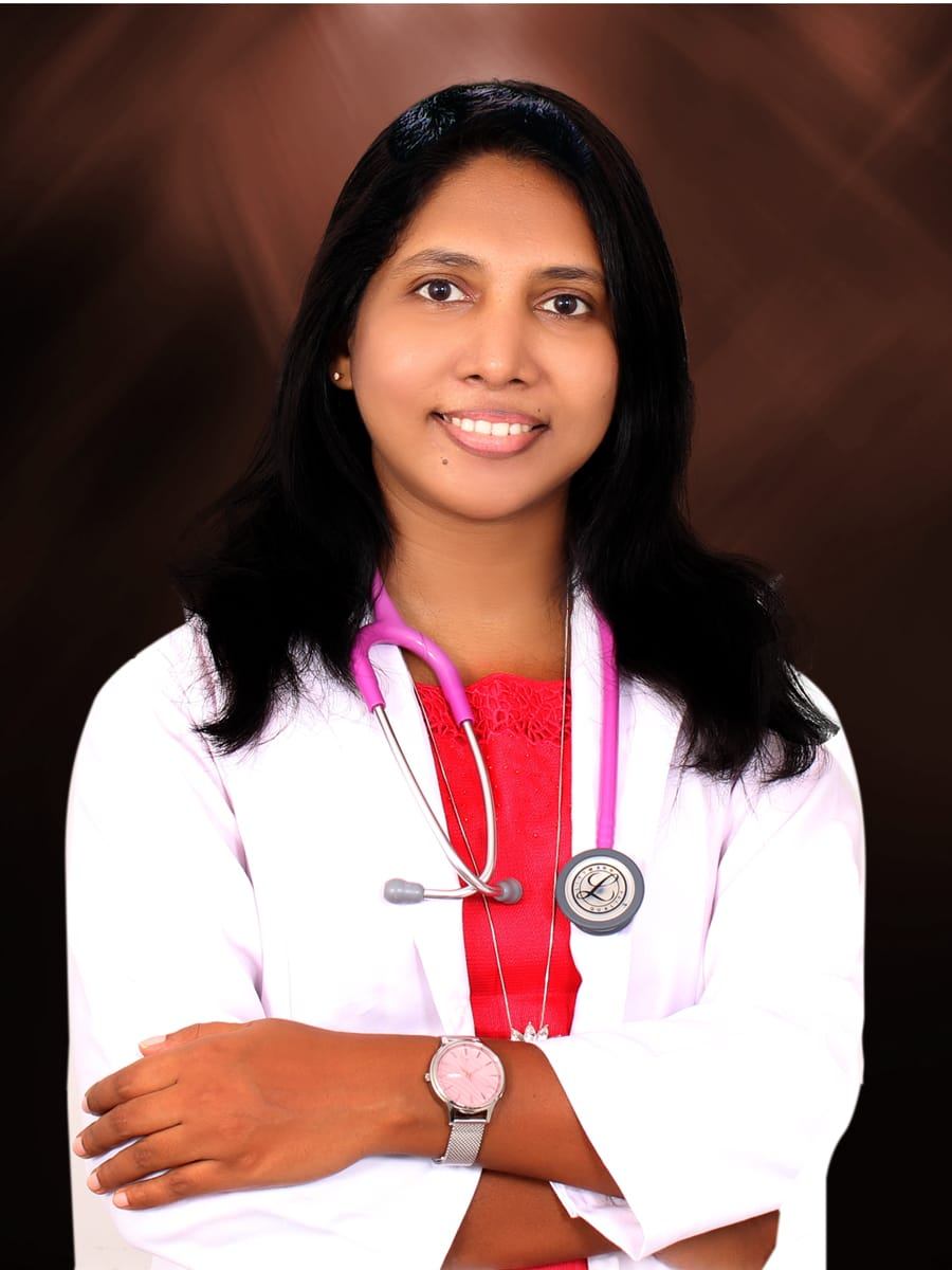 Dr Miny Abraham